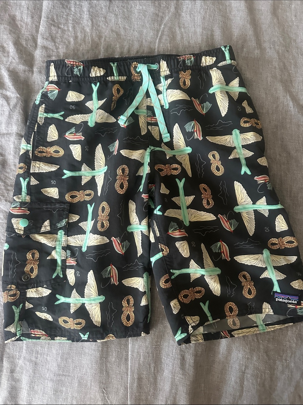 Kids Patagonia Black Swim Shorts with Mint Green & Cream Tropical Print